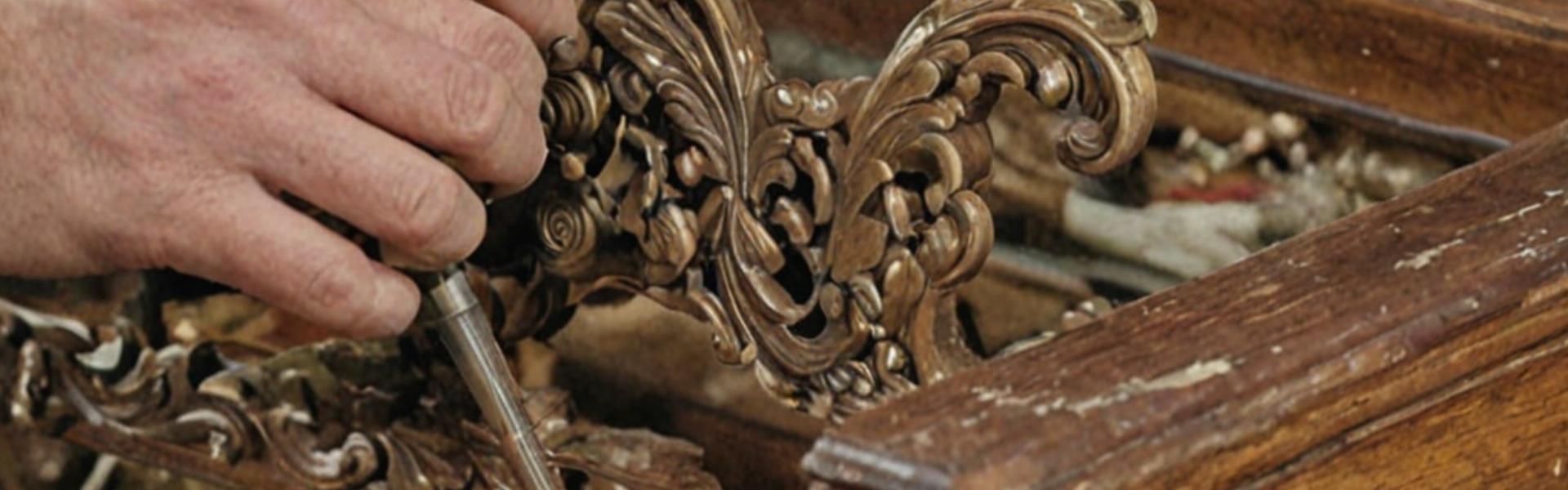 Expert antique furniture restoration in progress