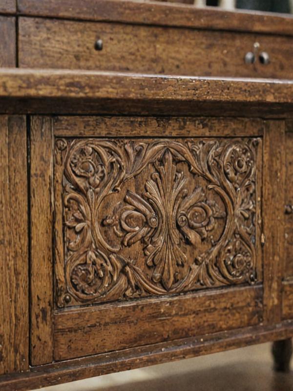 Detailed restoration work on antique wooden furniture